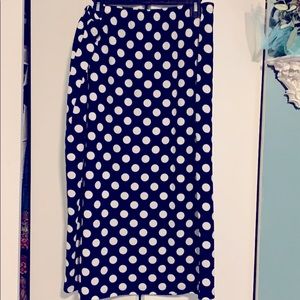 Nuggles Midi navy skirt with white polka dots.